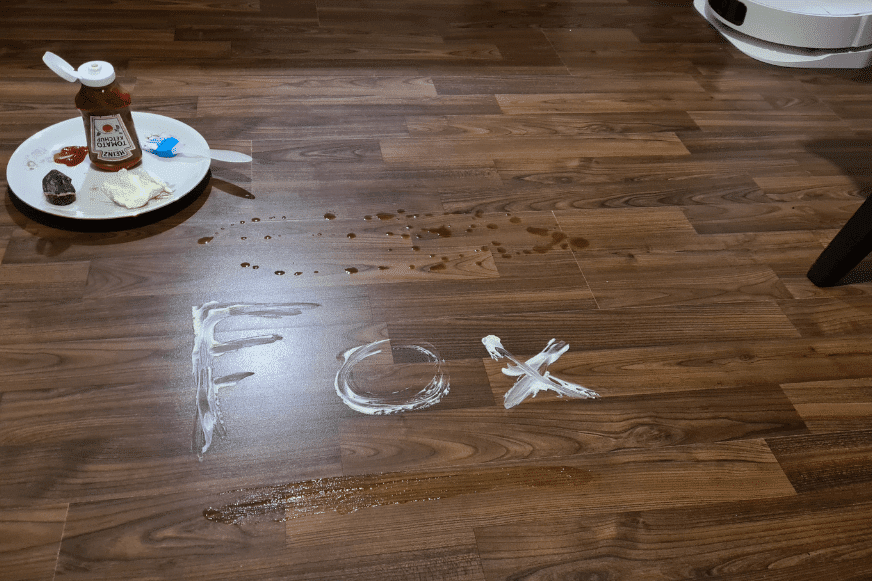 Different stains are created for the mopping test of the Dreame L10s Ultra.